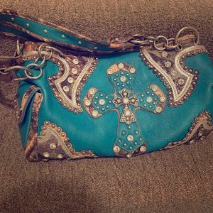 Turquoise purse with camo and rhinestones
